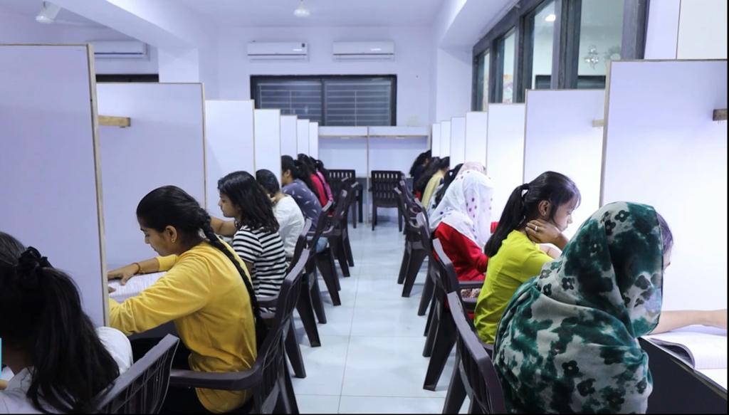 Photo of SDG Girls Hostel study room with students